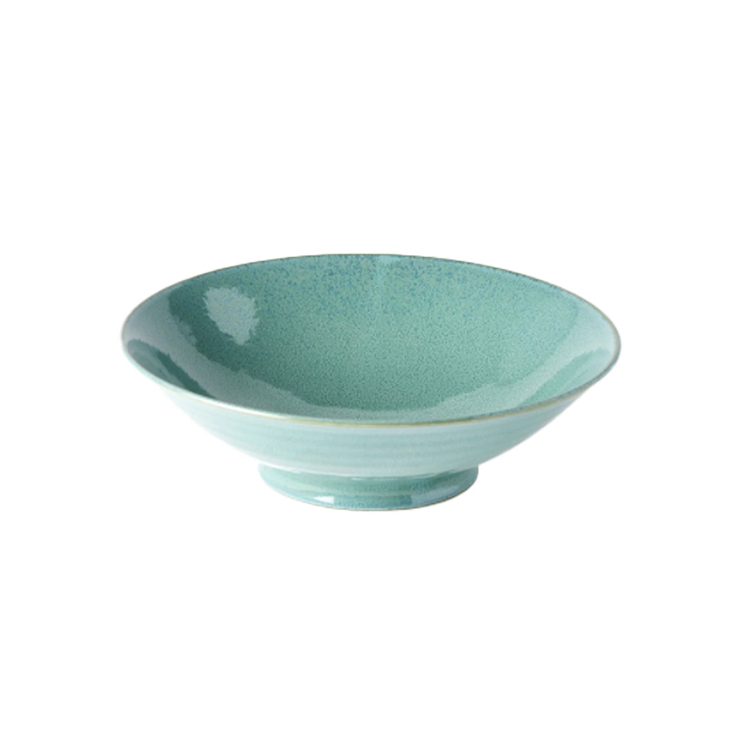 The Ramen Bowl - Peacock is a shallow, round, light green ceramic bowl with a slightly flared rim and small footed base, perfect for serving Japanese meals. Displayed against a white background.