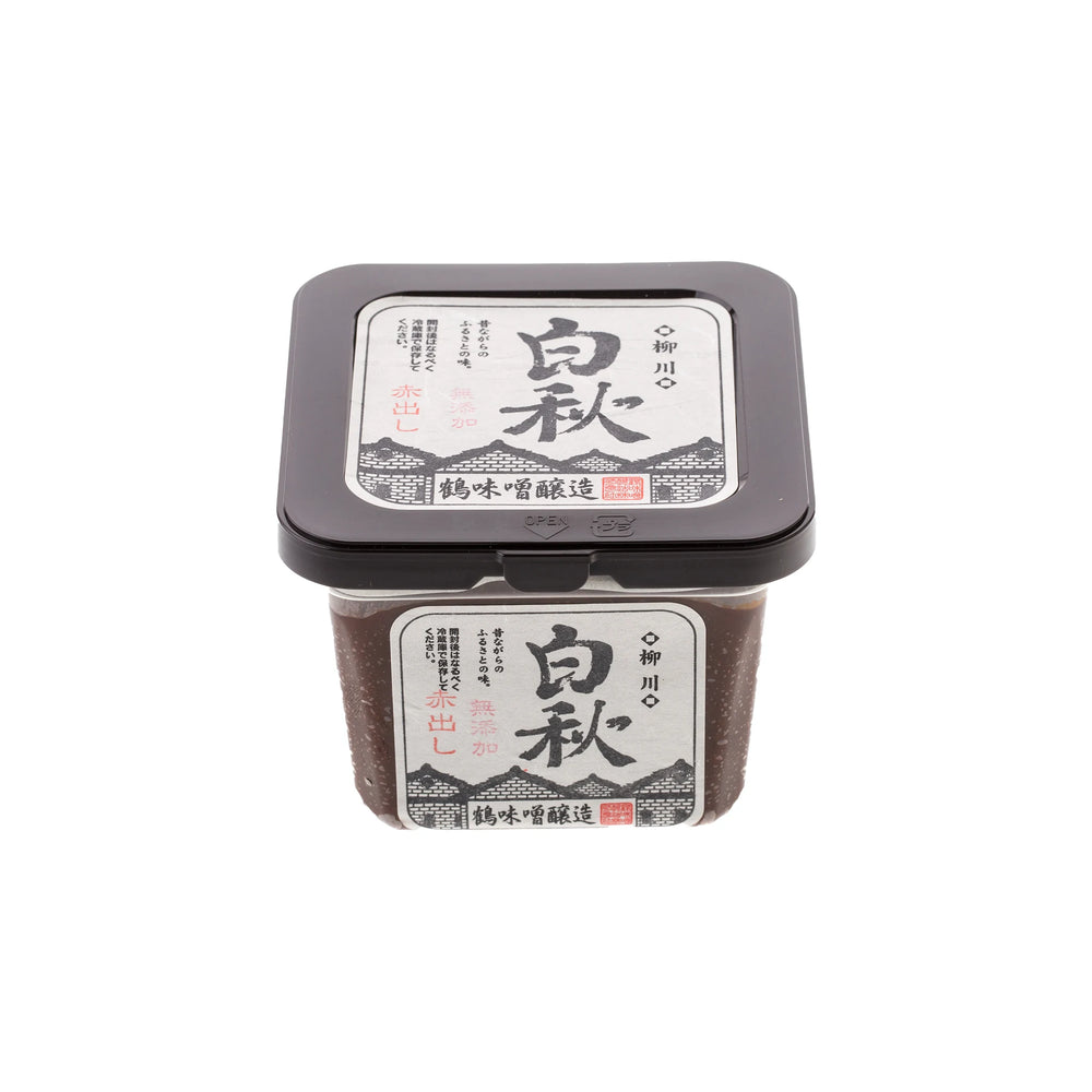 A square plastic container of Red Miso - 500g with Japanese text on the black lid and front label, set against a white background.