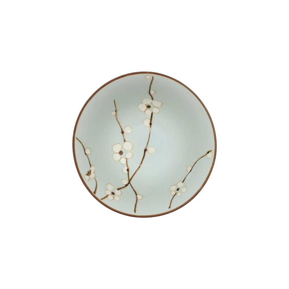 A charming Japanese porcelain rice bowl, the Rice Bowl - Green Cherry Blossom features a round ceramic design with a green cherry blossom motif.