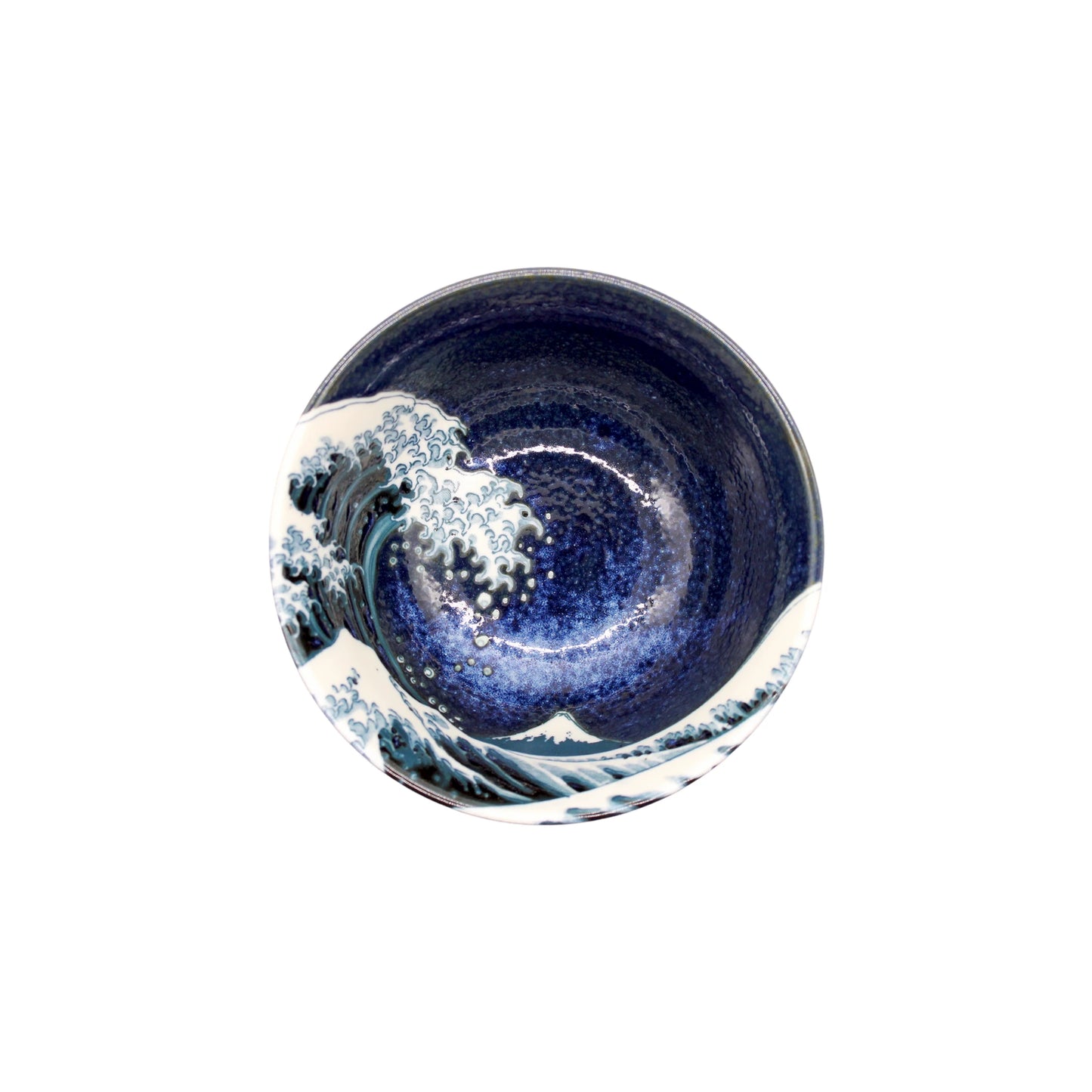 The Rice Bowl - Great Wave Design Blue is crafted from Minoyaki porcelain, featuring blue and white waves with a small Mount Fuji, inspired by The Great Wave off Kanagawa.