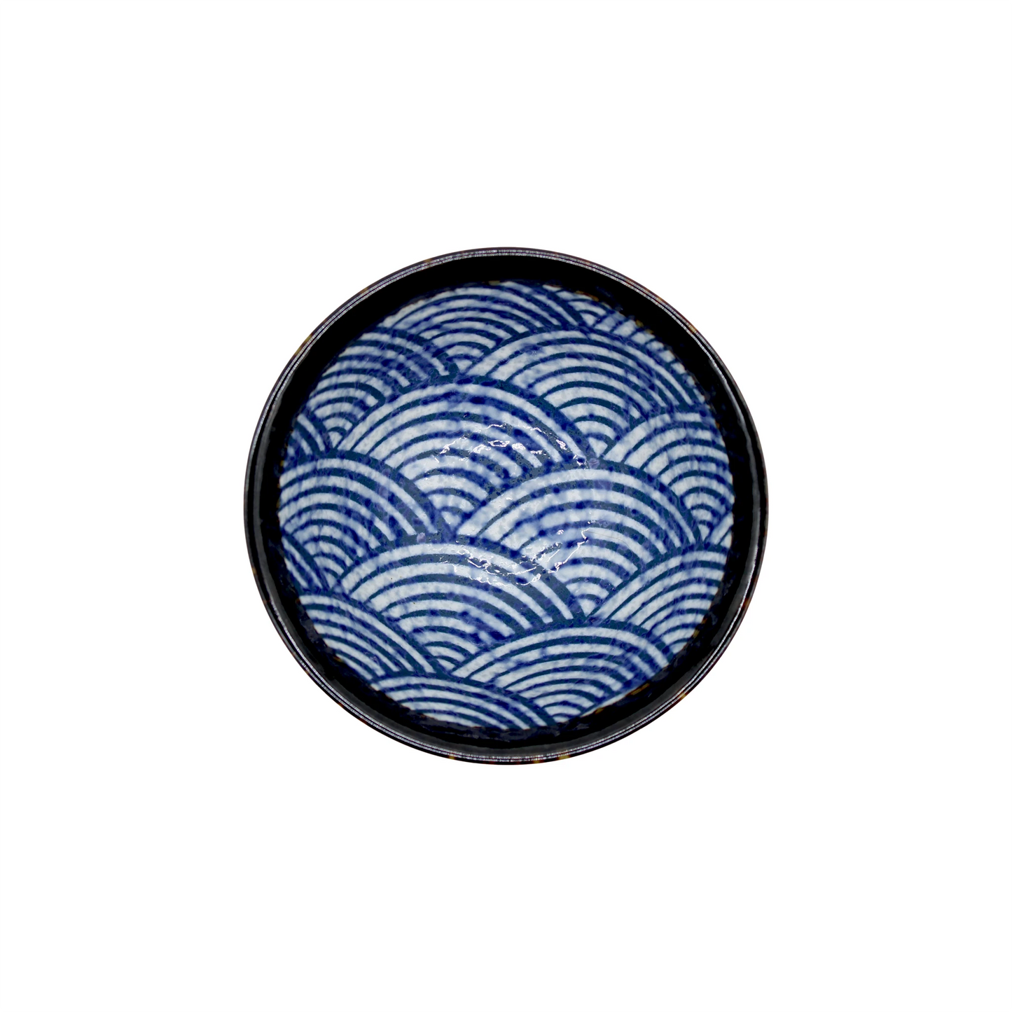 The Rice Bowl - Japanese Wave is a round ceramic bowl featuring a blue and white wave pattern on the inside, inspired by traditional Japanese art, shown from above on a white background.