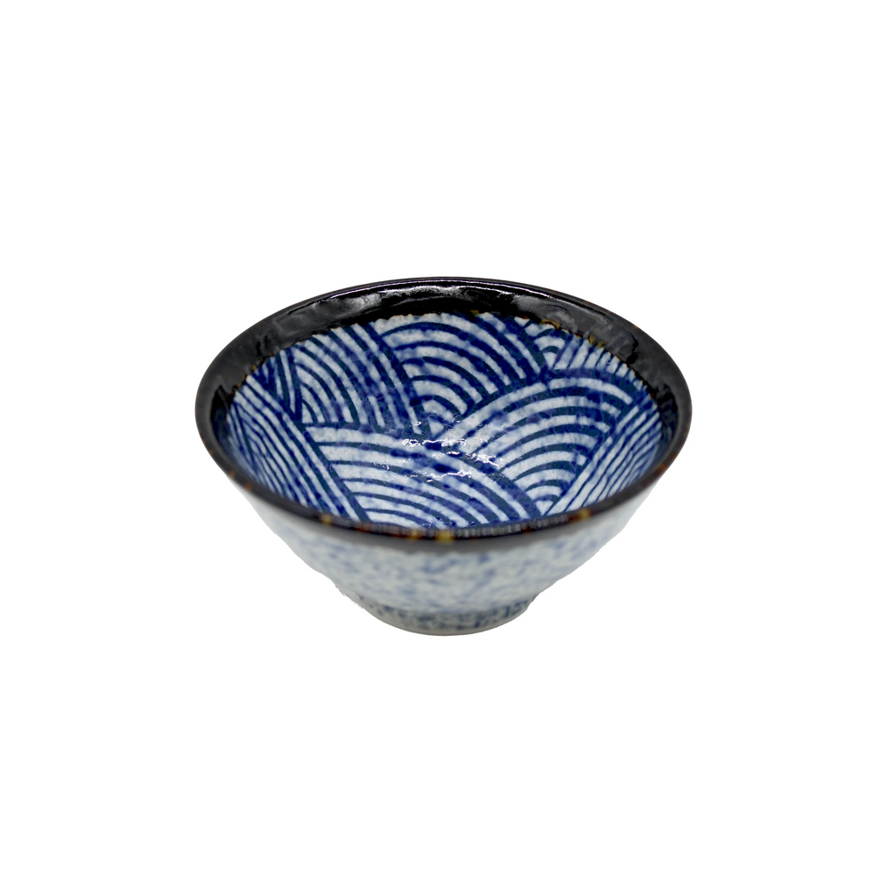 
                  
                    The Rice Bowl - Japanese Wave features a small Japanese ceramic design with a blue and white geometric wave pattern and dark rim, inspired by traditional art, shown on a white background.
                  
                