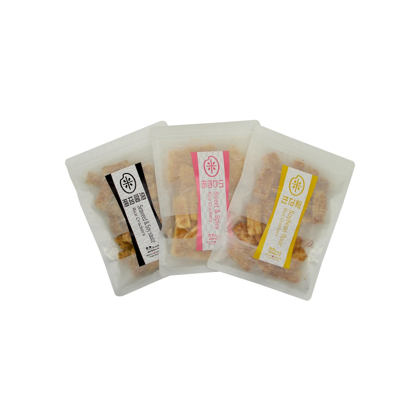 
                  
                    Three packets from the Japanese Senbei Rice Cracker Set, each individually wrapped and featuring black, pink, and yellow Japanese labels, are displayed on a white background. These classic senbei are savory Japanese rice crackers known for their authentic flavor and satisfying crunch.
                  
                
