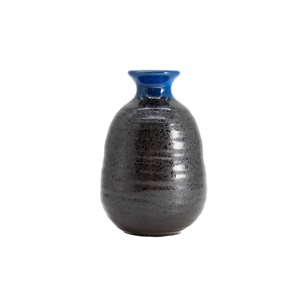 The Sake Carafe - Grey with Blue Top features a compact, rounded ceramic design with a glossy grey body and a narrow, vibrant blue rim. Photographed on a white background, its ideal for enhancing your Japanese dining experience.