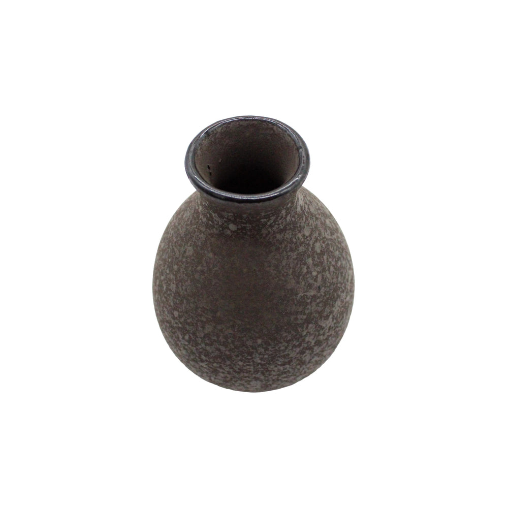 
                  
                    A small, round, textured gray Sake Carafe - Earth made of Minoyaki porcelain is photographed from above on a white background, reflecting Japanese tradition.
                  
                