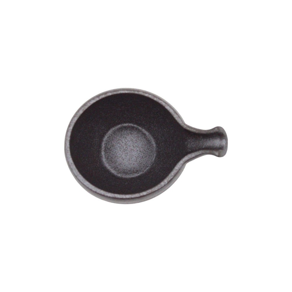 The Minoyaki “Tetsu” sake carafe is a small, round, black ceramic vessel with a handle, shown from above on a white background.