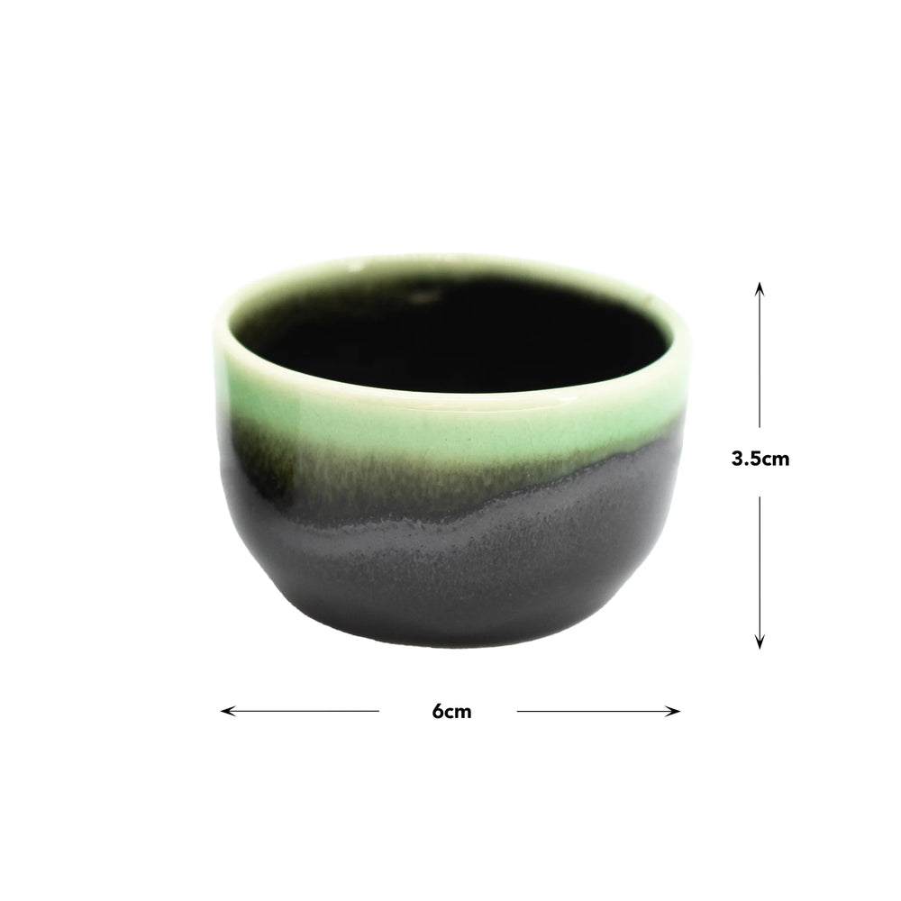 
                  
                    Sake Cup - Black with Bright Green Drip
                  
                