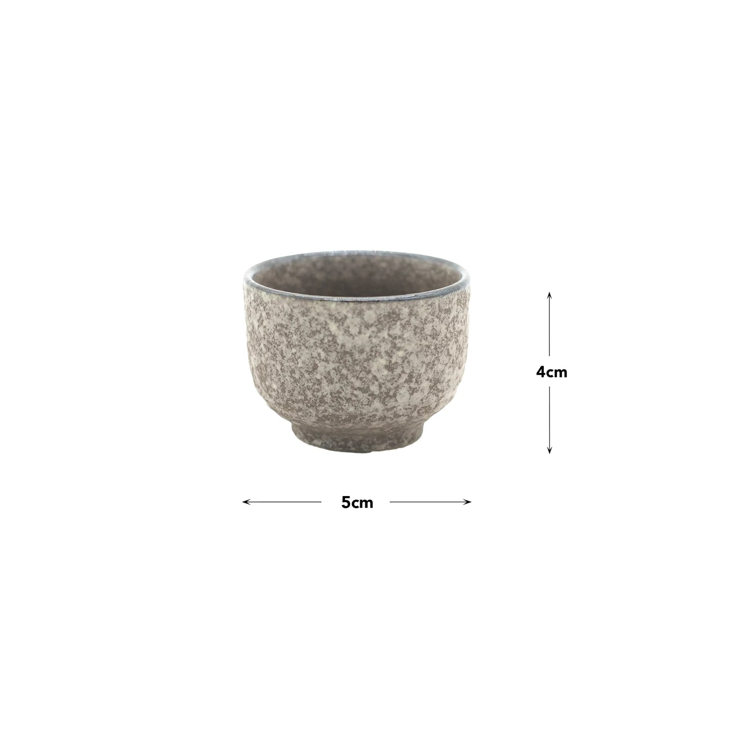 The Sake Cup - Earth is a small gray speckled Minoyaki porcelain cup (5 cm wide, 4 cm tall), showcasing Japanese ceramic craftsmanship. Displayed on a plain white background, its perfect as an earth-inspired sake cup.