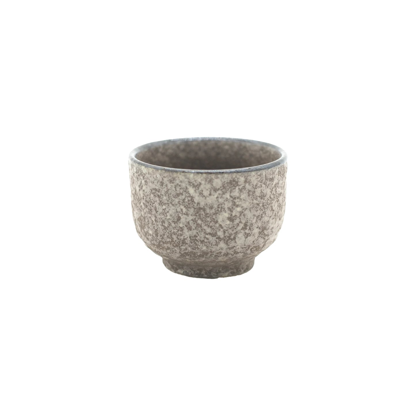 The Sake Cup - Earth is a small, round Minoyaki porcelain cup in gray with a speckled texture, highlighting Japanese ceramic craftsmanship against a white background.