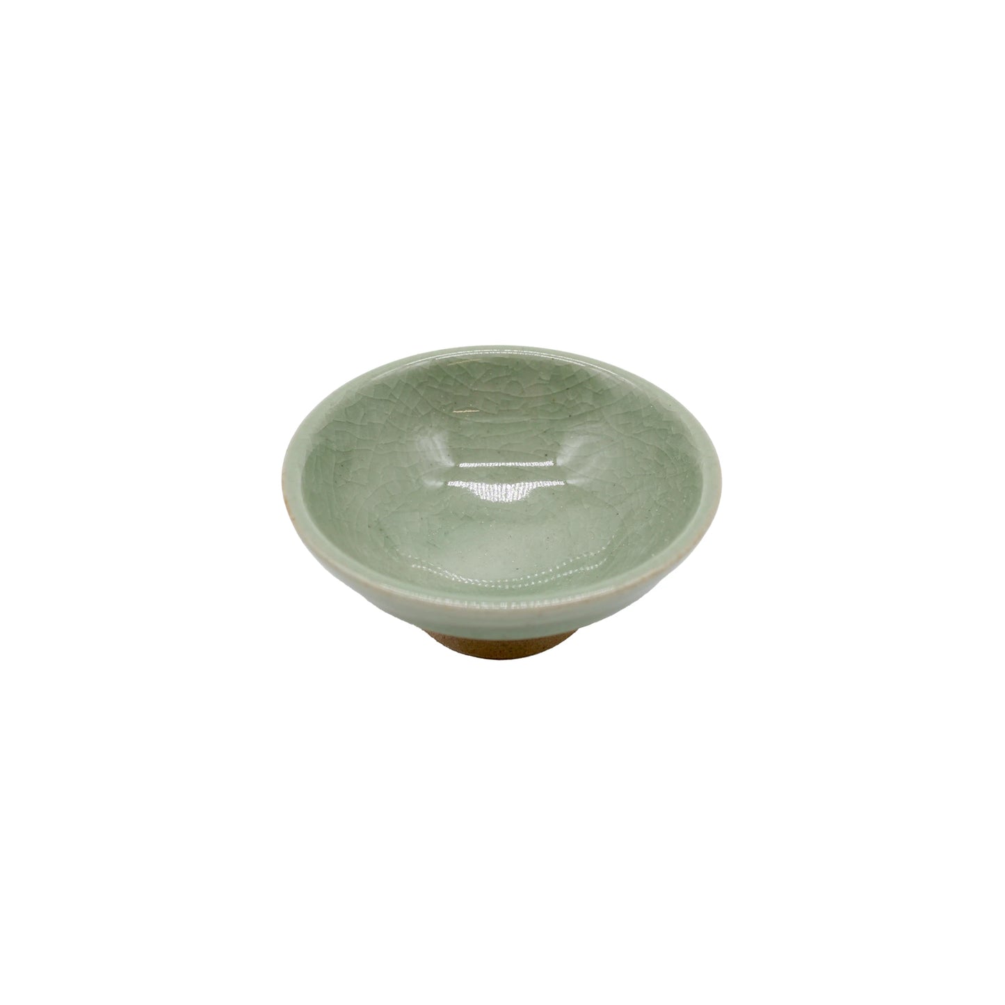 
                  
                    A compact, celadon green ceramic Sake Cup - Flat Sakazuki with a short base is displayed on a white background, evoking the traditional elegance of Iga ware craftsmanship.
                  
                