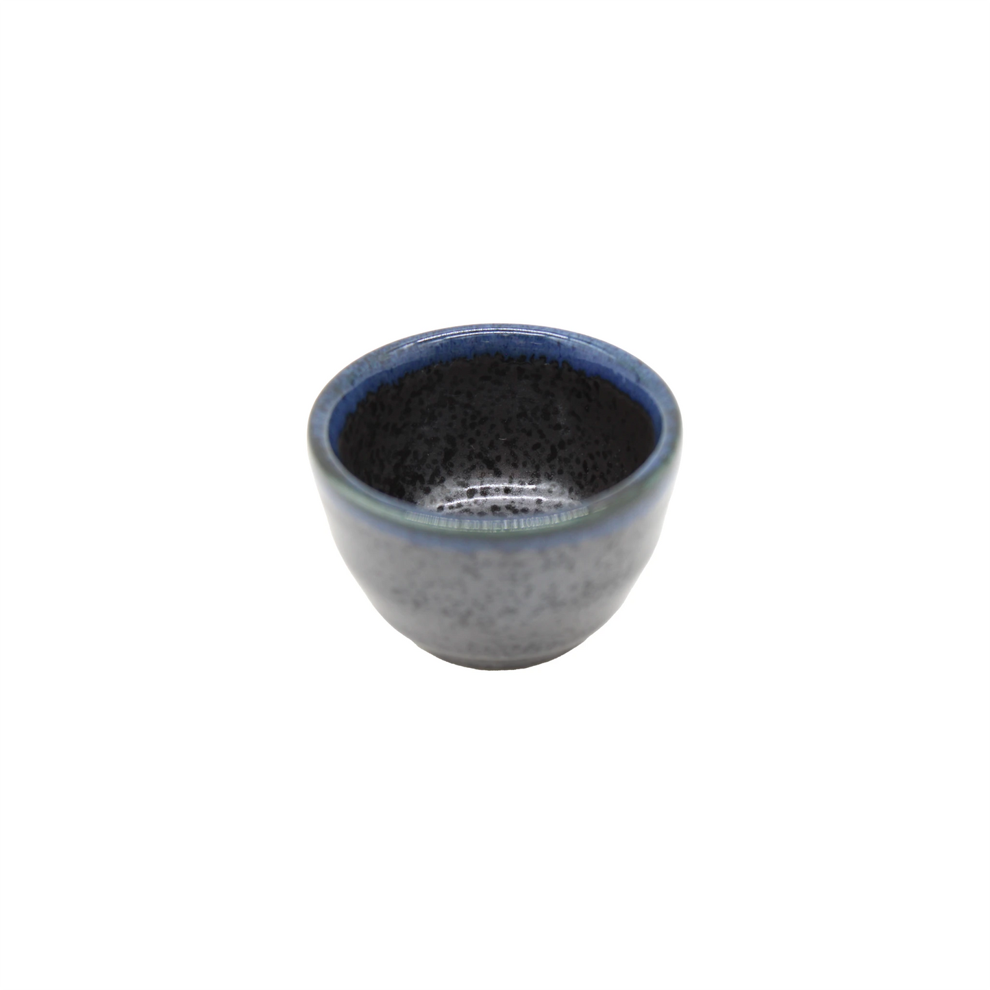 The Sake Cup - Indigo Dipped Edge is a small, round Minoyaki porcelain bowl featuring a speckled gray interior and an indigo blue rim, reminiscent of an Ichi kiln sake cup, shown against a white background.
