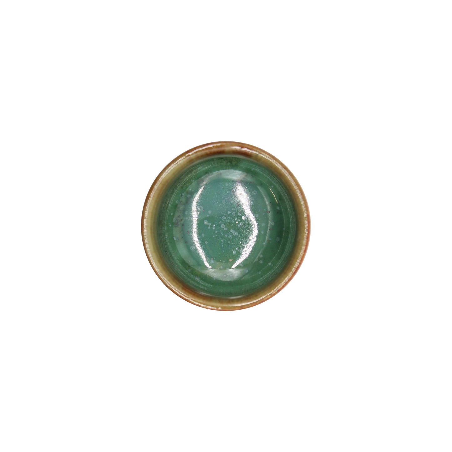 
                  
                    The Sake Cup - Moss Green is a small, round Japanese ceramic cup with a moss green glazed interior and brown rim, shown from above on a white background.
                  
                