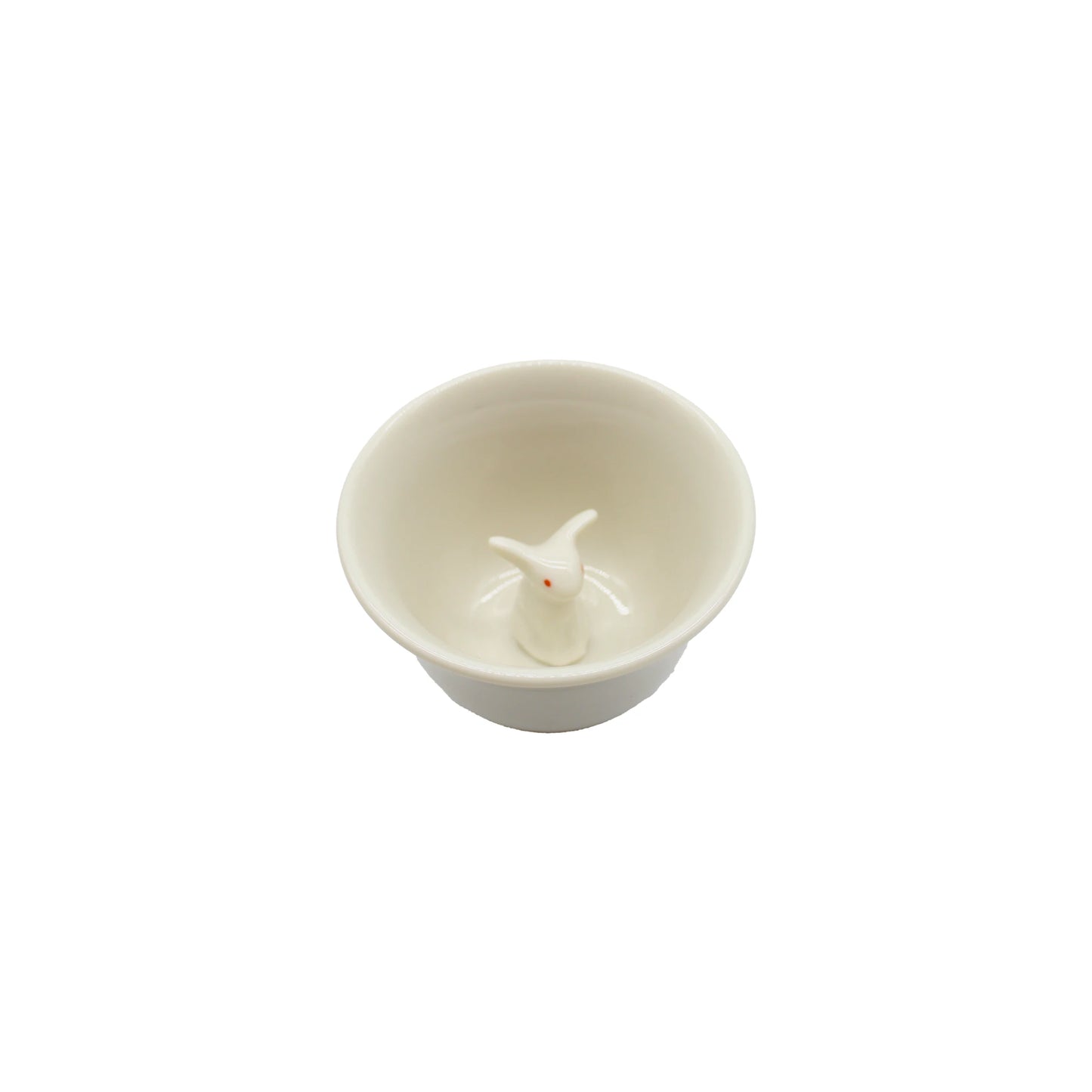 
                  
                    Sake Cup Boxed Set - Rabbit Design: White ceramic sake cup featuring a small sculpted rabbit motif at the center, photographed on a plain white background.
                  
                