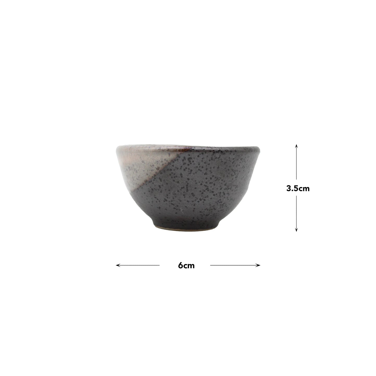 
                  
                    The Sake Cup - Black & Sakura Pink is a small Mino-style cup, featuring black speckles and measuring 6 cm wide by 3.5 cm tall.
                  
                