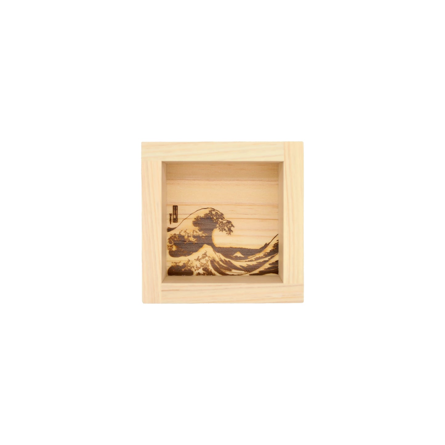 
                  
                    The Sake Cup - 'Masu' Wood - Hokusai Design is a square Japanese wooden cup featuring an engraved Great Wave off Kanagawa inspired by Hokusai on its back panel.
                  
                
