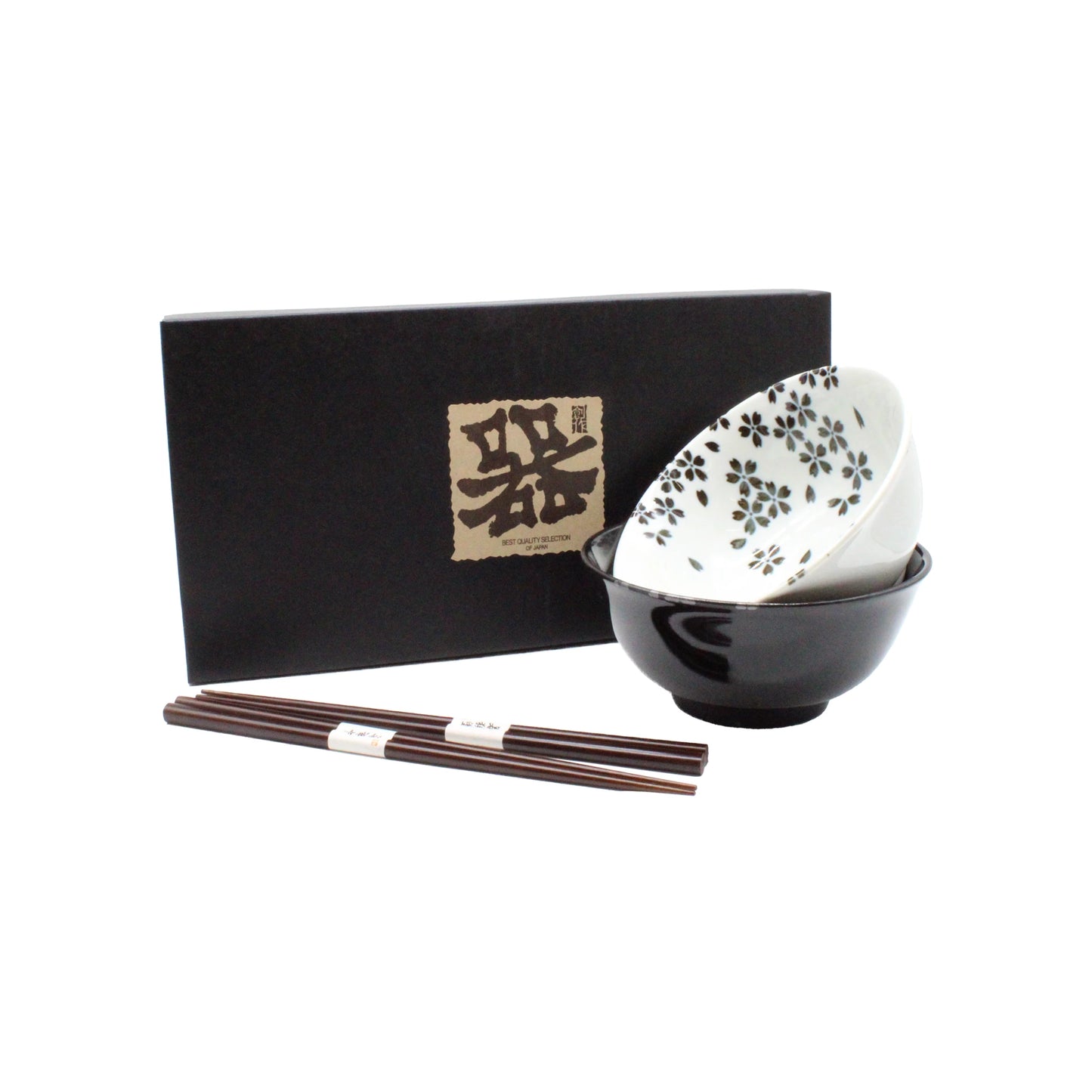 
                  
                    The Sakura Blossom Bowls Gift Set – Black & White features two ceramic bowls (one with a sakura motif, one solid black), presented in front of a black box with Japanese writing, and includes two pairs of chopsticks.
                  
                