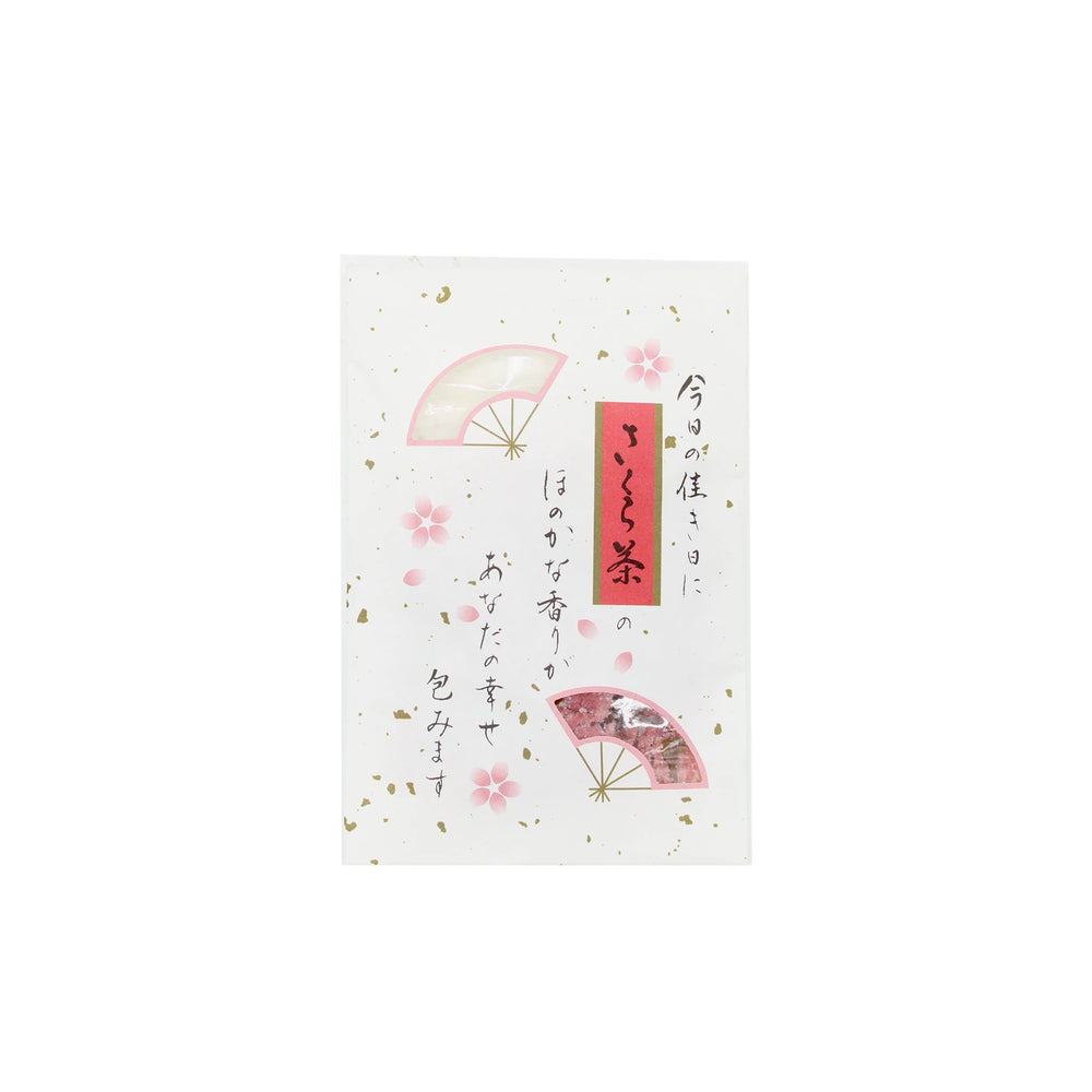 A decorative card featuring Japanese text, pink cherry blossoms, and fan motifs on white with gold flecks—perfect for gifting Salted Cherry Blossom Tea - 40g or celebrating Sakura Tea traditions.