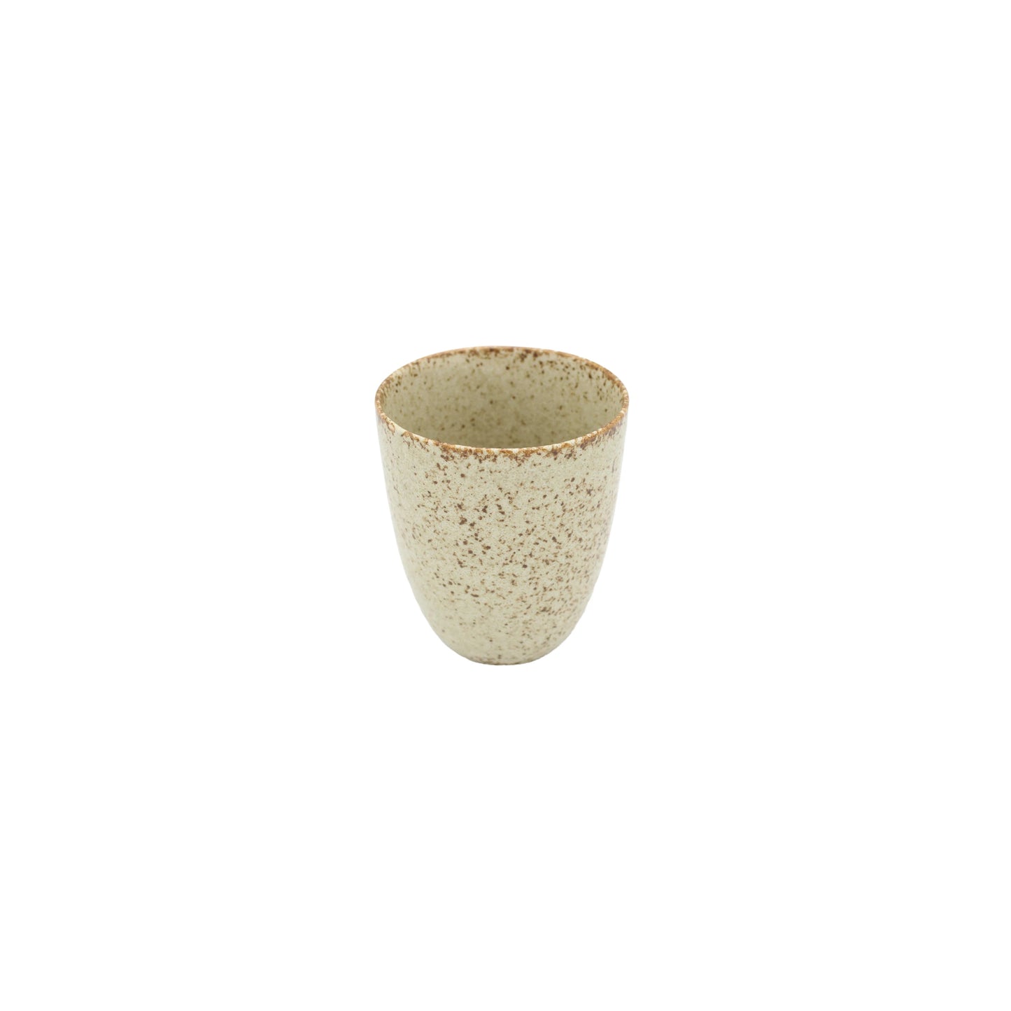 The Tea Mug - Sand Fade is a small, beige handmade Minoyaki porcelain mug with a speckled pattern, displayed on a white background.