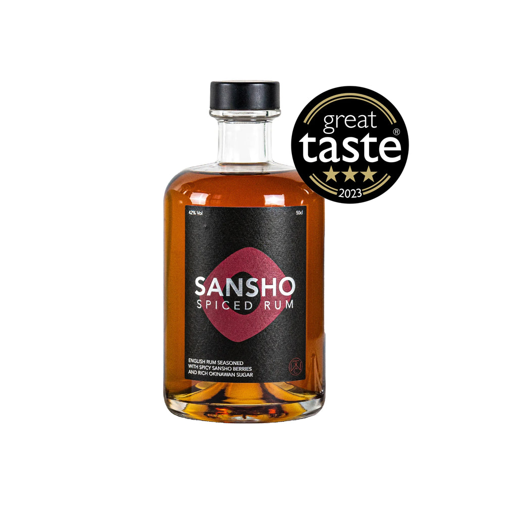 A 50cl bottle of Sansho Spiced Rum with a black label and Great Taste 2023 badge, infused with Sansho berries for unique Japanese flavours.