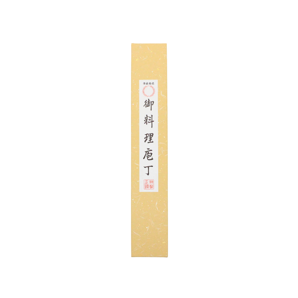 
                  
                    A rectangular yellow box with Japanese text vertically on the front label, ideal for storing the Santoku Multi-Purpose Knife Black Forged 180mm.
                  
                