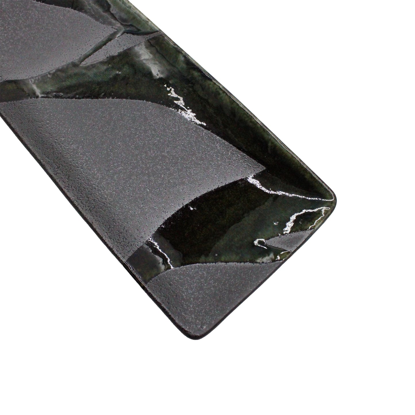 
                  
                    The Sashimi Platter - Mino Craft Green and Grey is a rectangular ceramic dish featuring a glossy green and grey abstract glaze, bringing an artisanal wabi-sabi touch to your table setting.
                  
                