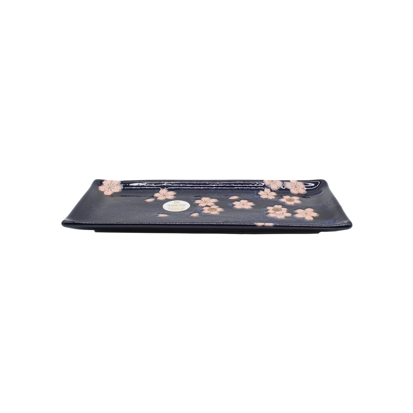 
                  
                    The Sashimi Platter - Navy & Pink Sakura Blossom is a rectangular Japanese ceramic platter with pink sakura cherry blossom designs, shown with a small round sticker against a white background.
                  
                
