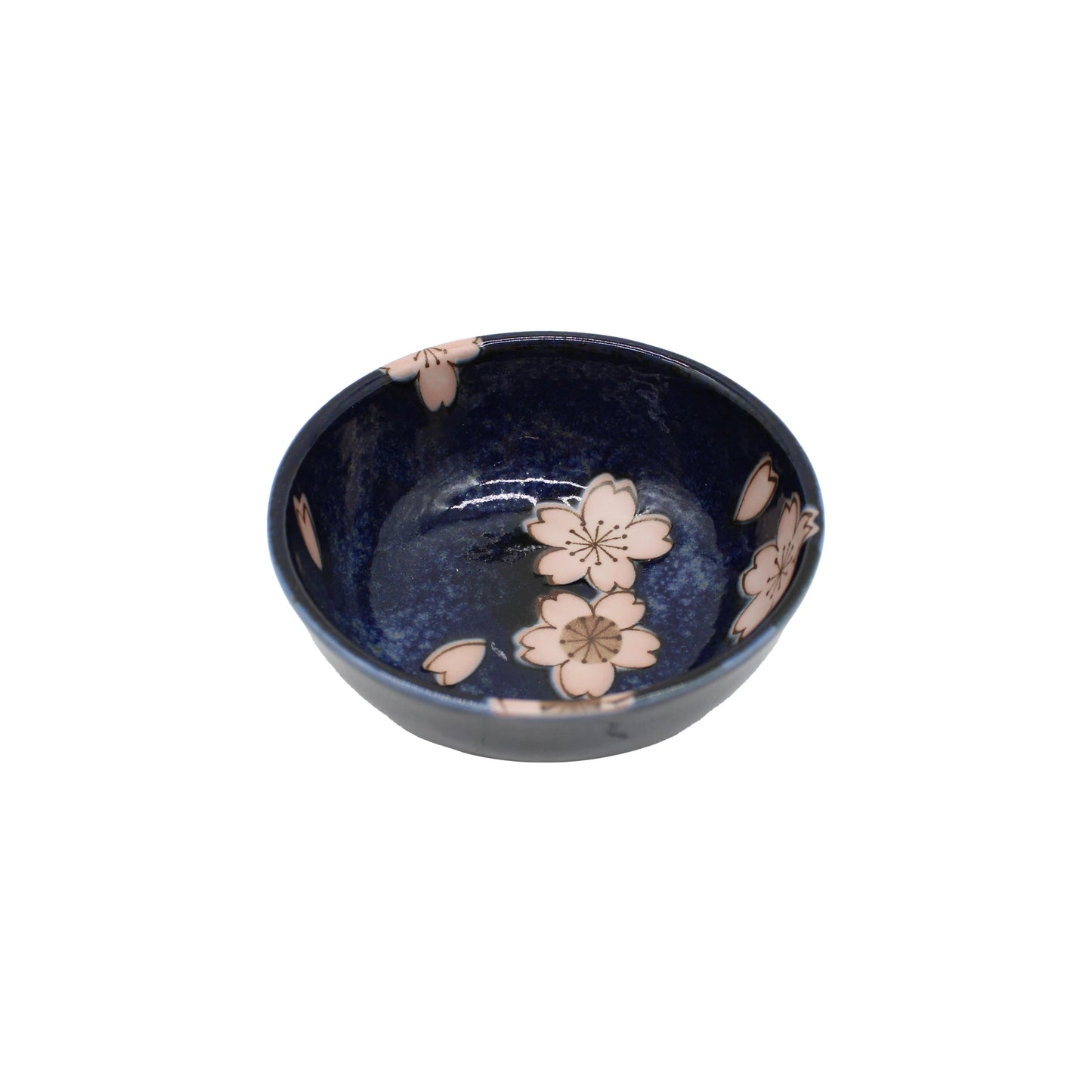 The Soy Sauce Dish - Navy & Pink Sakura Blossom is a small dark blue Japanese ceramic bowl featuring delicate sakura designs on the inside and rim, displayed on a white background.