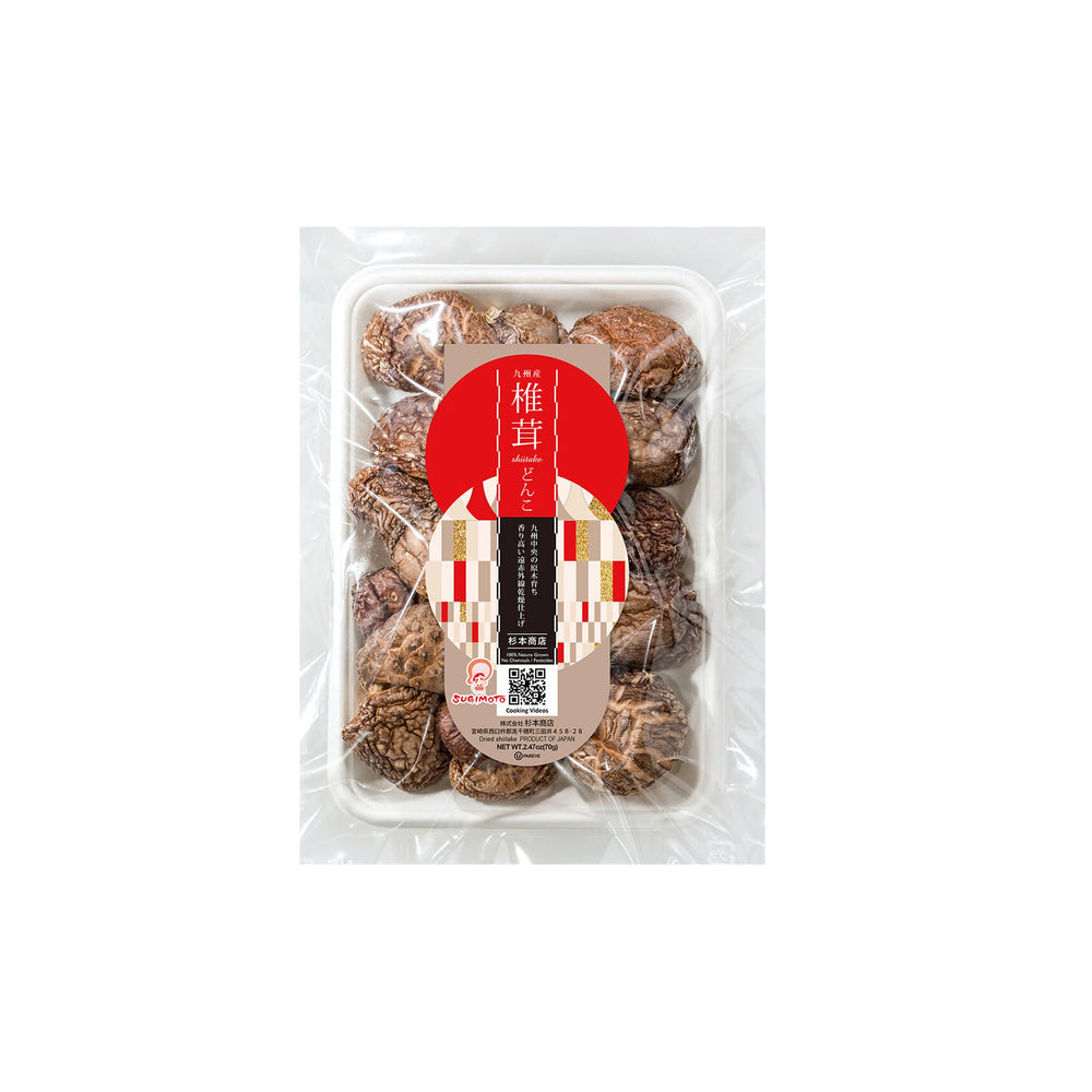 A plastic tray of Dried Organic Donko Shiitake Mushrooms 25-42mm (70g), prized for umami, sealed in clear packaging with a red and beige Japanese label and a front QR code.