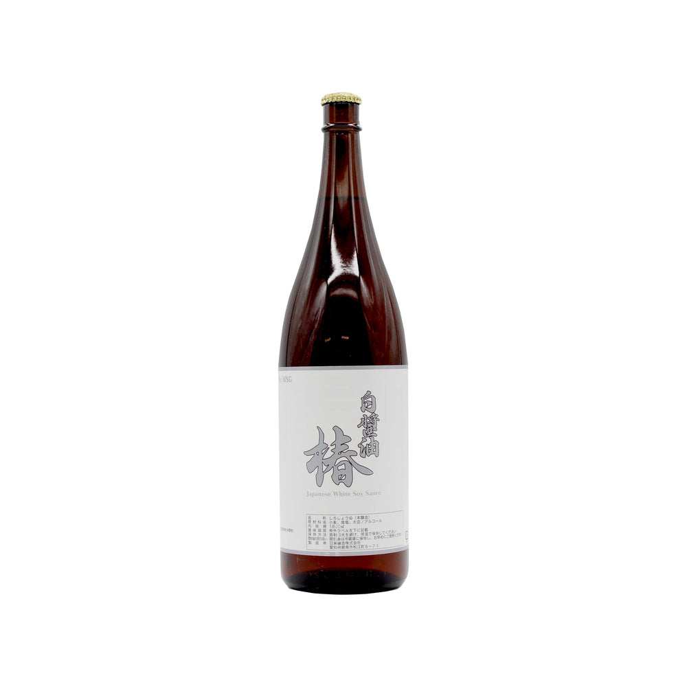 A brown glass bottle of Shiro Shoyu Tsubaki, White Soy Sauce, with a white label featuring Japanese text stands upright on a plain white background—ideal for enhancing your favorite Japanese dishes with authentic flavor.