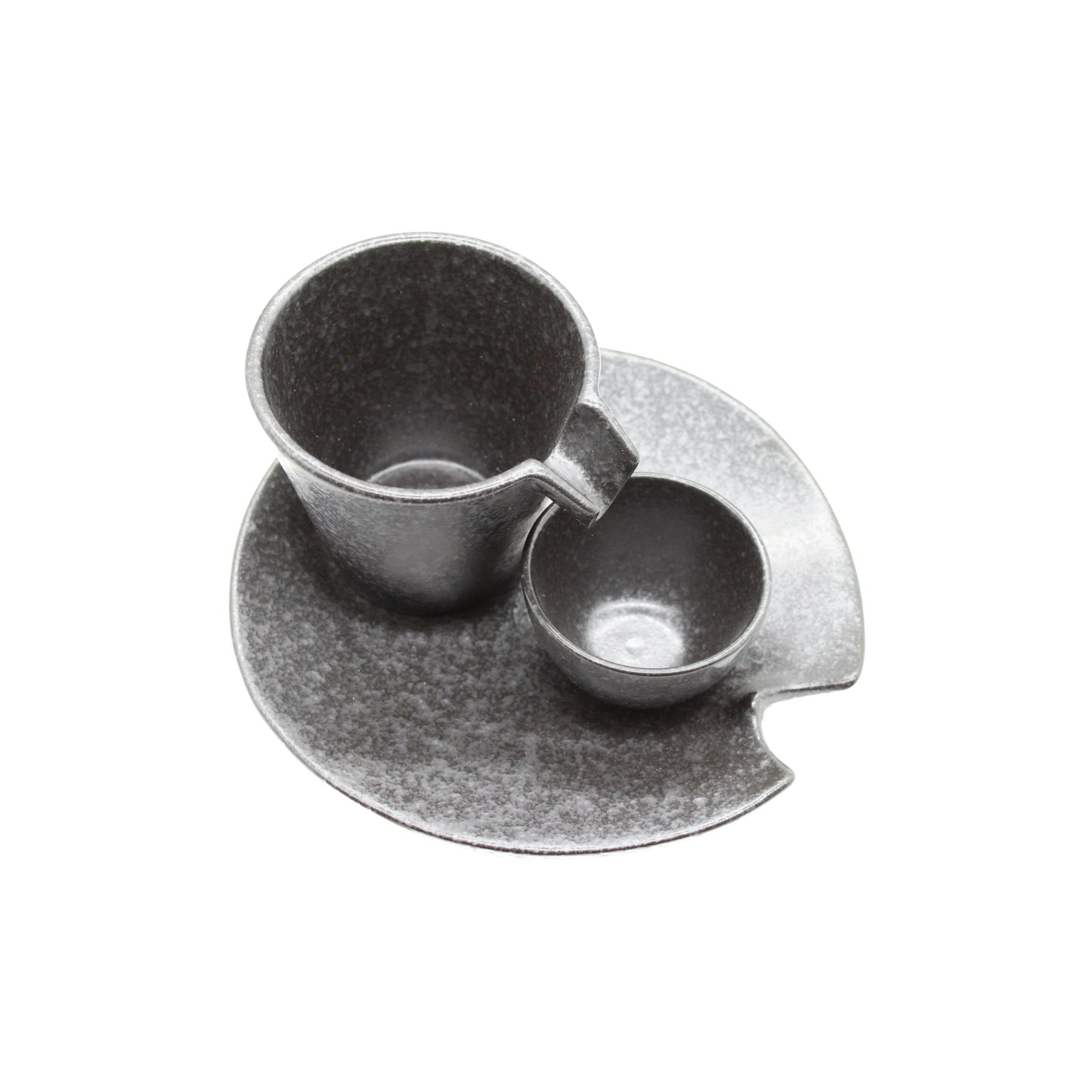 
                  
                    The Shizuru Sake Set - Black & Silver by Kaneko Ko-hyo, ideal for sake enthusiasts, is displayed on a matching round saucer featuring a small edge notch, all set against a white background.
                  
                