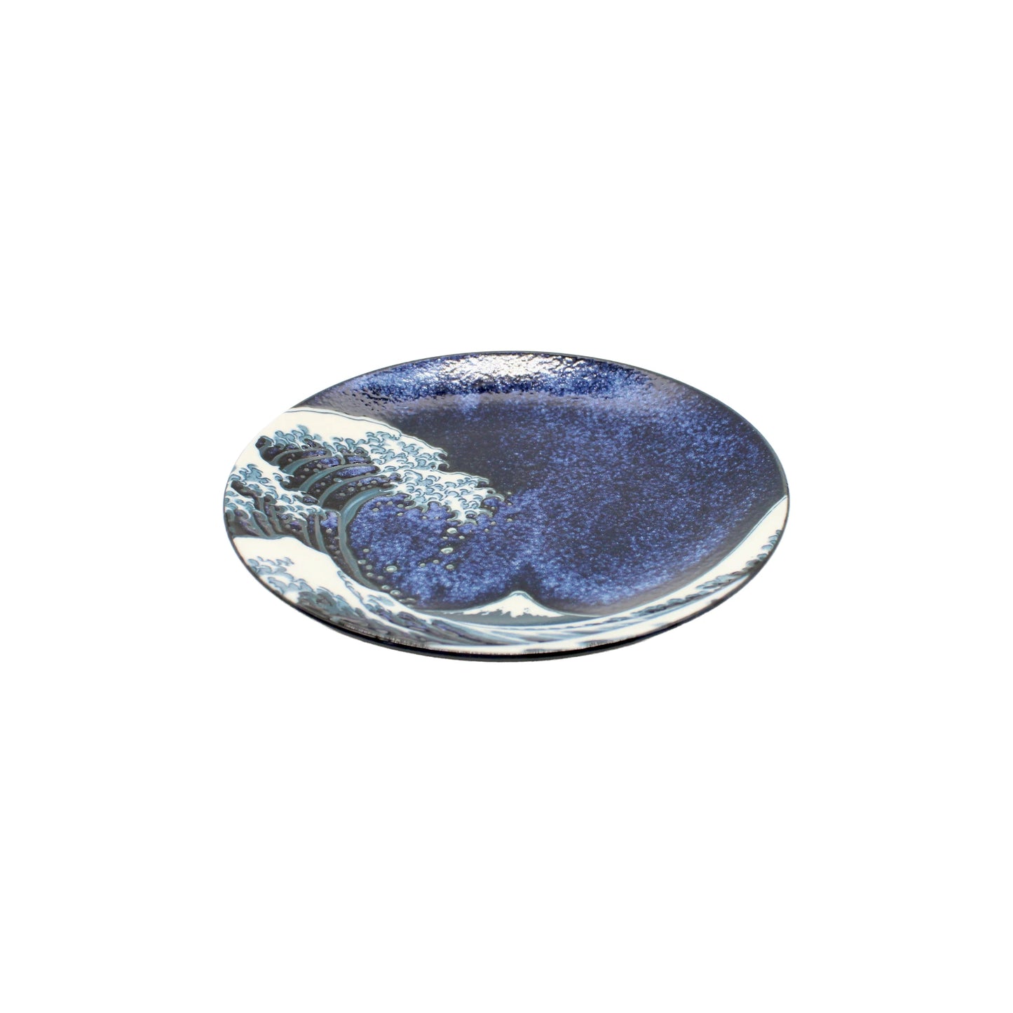 The Side Plate - Great Wave Design Blue is a round Minoyaki porcelain plate, handcrafted at the Ichi kiln, featuring a blue and white wave pattern inspired by the Great Wave off Kanagawa and shown on a white background.