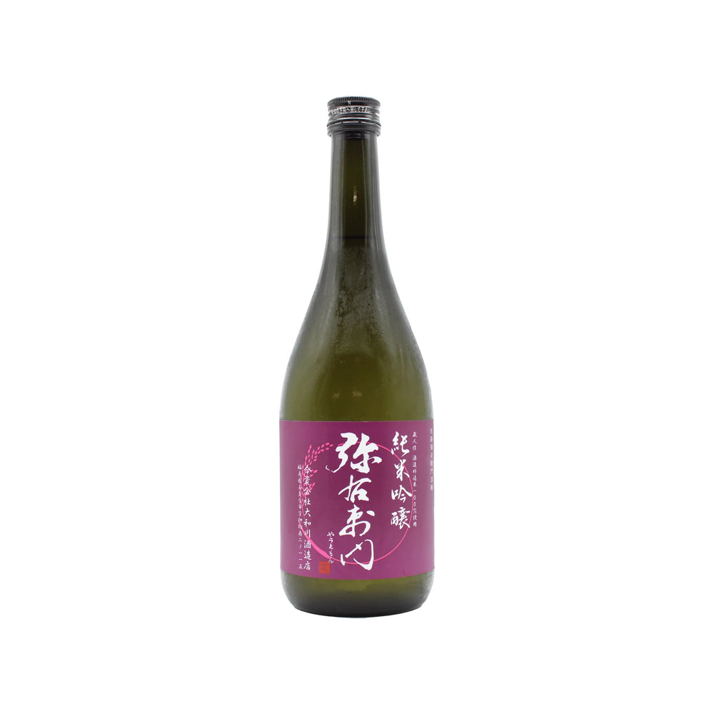 A green glass bottle of Yauemon Silent Forest Junmai Ginjo Sake (720ml), made with organic rice, features a purple label with white Japanese text and is photographed on a plain white background.