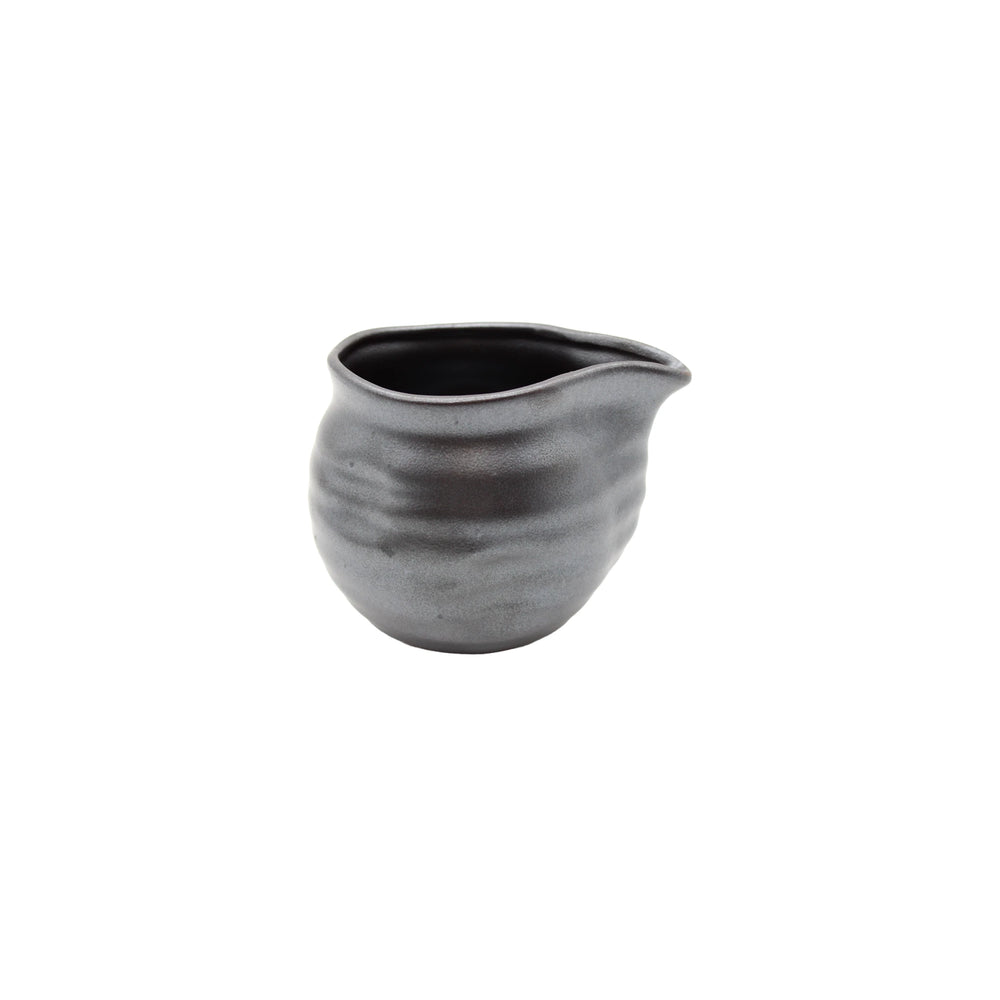 
                  
                    A compact, matte black and silver Soy Sauce Pourer with a rounded, wavy texture and spout, displayed against a white background.
                  
                