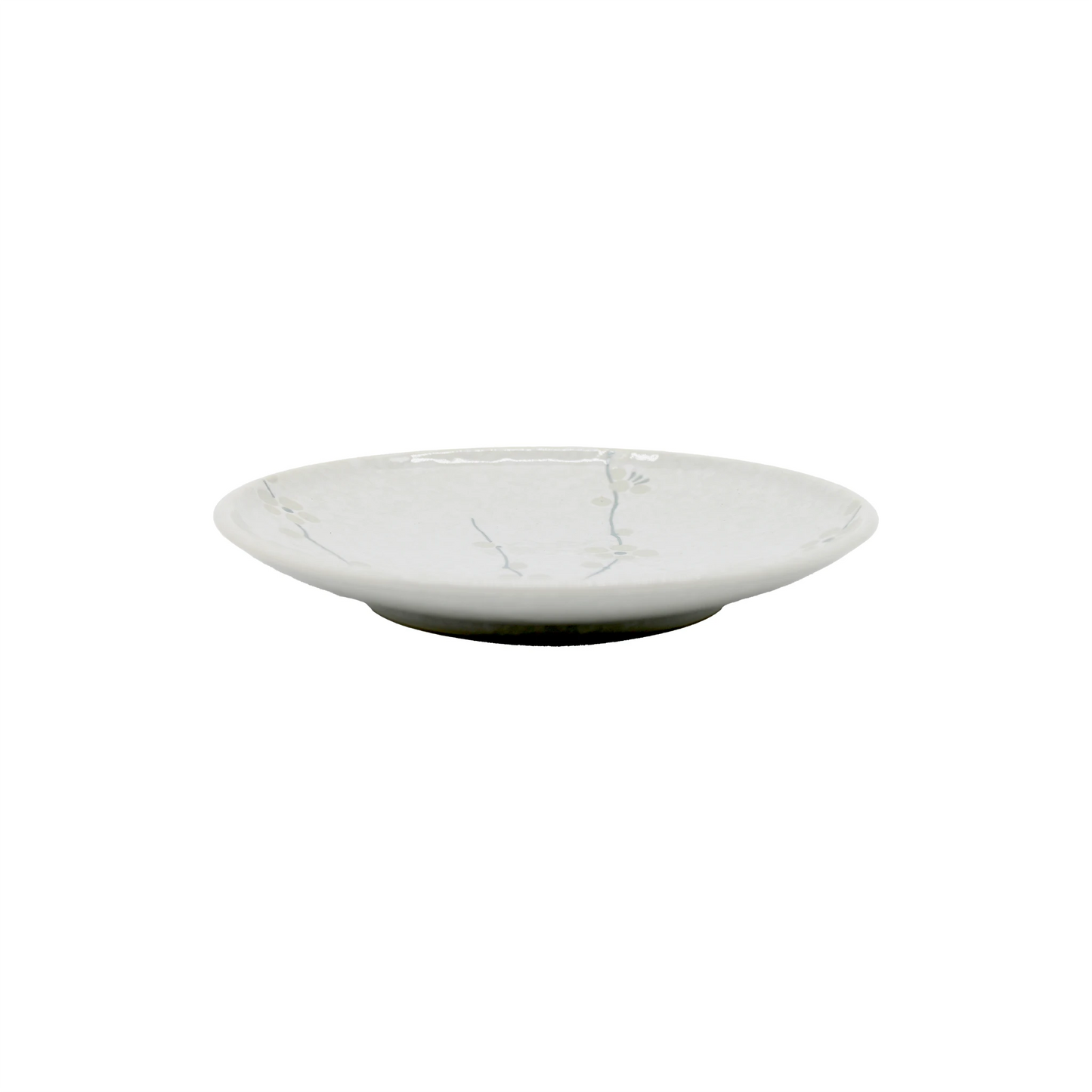 
                  
                    The Small Plate - White Blossom is a shallow, round white ceramic plate with a subtle, delicate gray branch pattern inspired by cherry blossoms, displayed against a plain white background.
                  
                