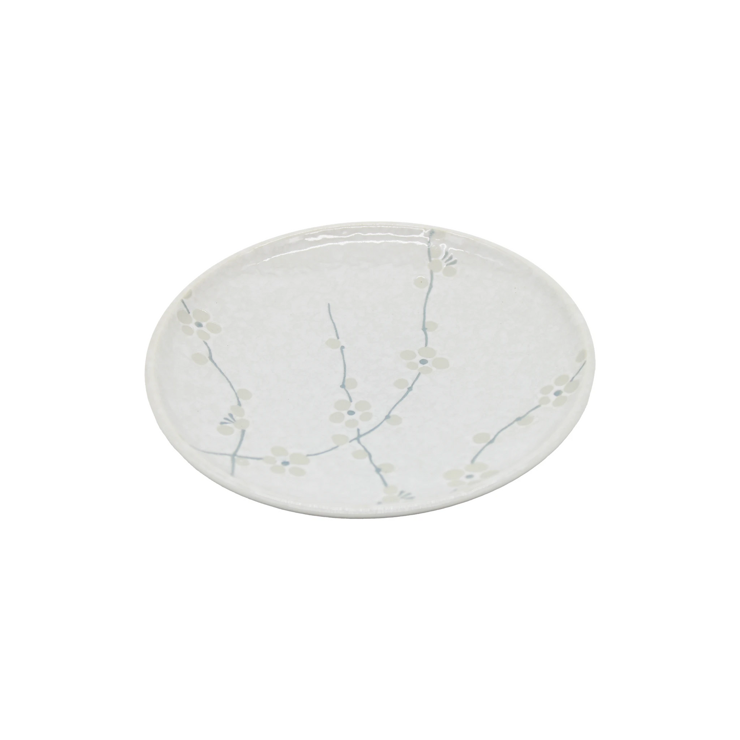 The Small Plate - White Blossom is a round Japanese porcelain plate featuring a light blue cherry blossom design around the rim on a white background.