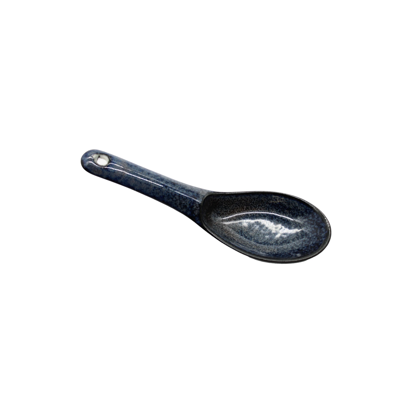 
                  
                    The Spoon - Indigo Blue is a dark blue porcelain Minoyaki soup spoon, inspired by traditional ramen spoons and chirirenge design, with a hole at the handles end and shown on a white background.
                  
                
