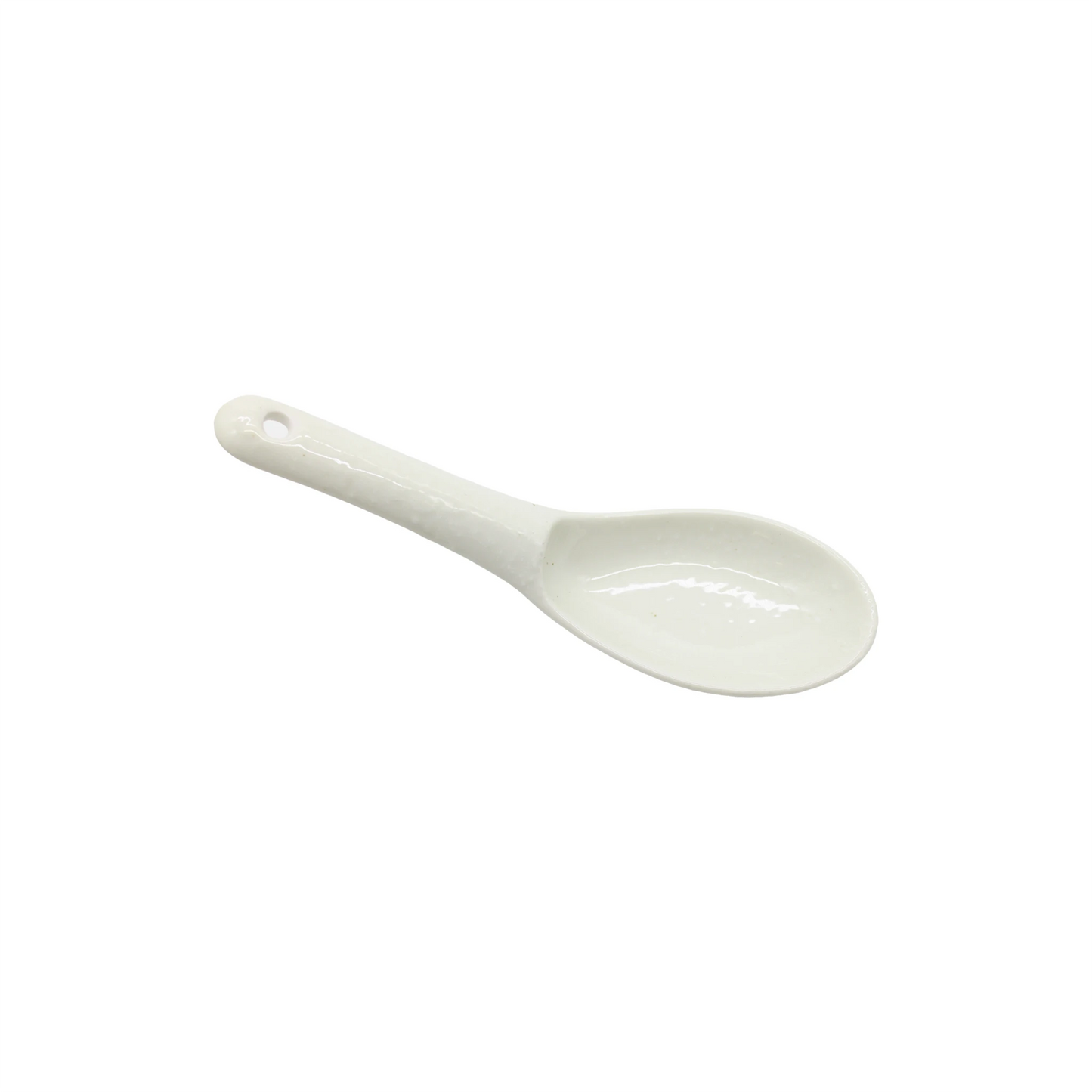 
                  
                    The Spoon - White Gloss is a white Minoyaki porcelain ramen spoon with a short handle and a hole at the end, shown on a plain white background.
                  
                
