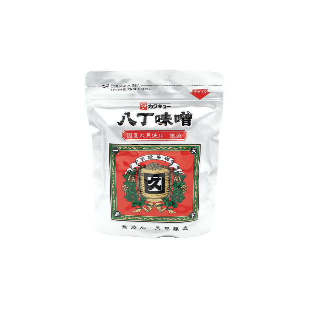 Soy Hatcho Miso - 300g comes in a white resealable bag with red, black, and green label text and traditional design accents, crafted using a natural fermentation process.