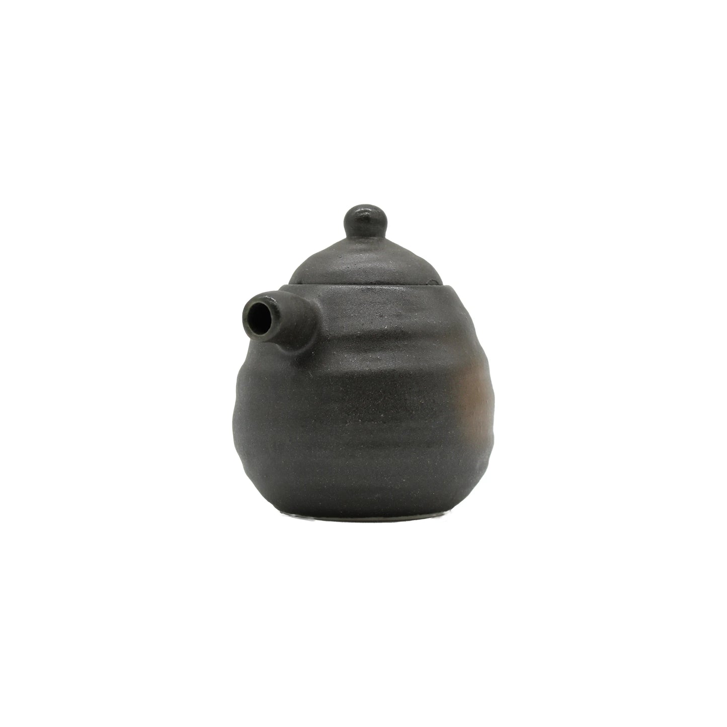 A small, matte black Soy Sauce Serving Pot - Black Bizen with a rounded, slightly irregular shape and a side spout is shown against a plain white background.