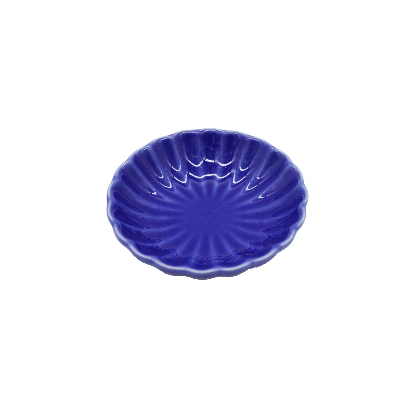 
                  
                    The Soy Sauce Dish - Chrysanthemum Blue, a small, round, scalloped-edge blue ceramic dish handcrafted in Japan, is displayed on a white background.
                  
                
