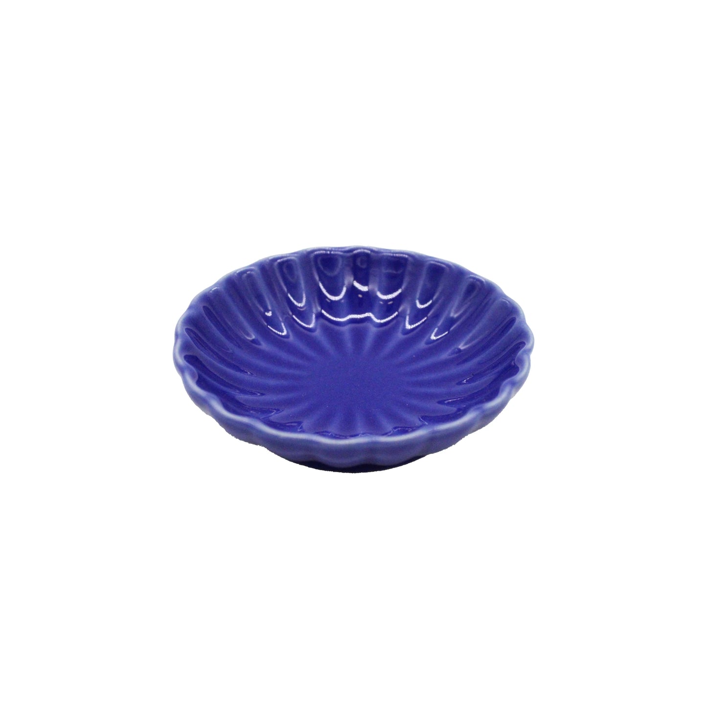 A small, round, blue ceramic soy sauce dish featuring a scalloped edge and radiating chrysanthemum design, handcrafted in Japan.