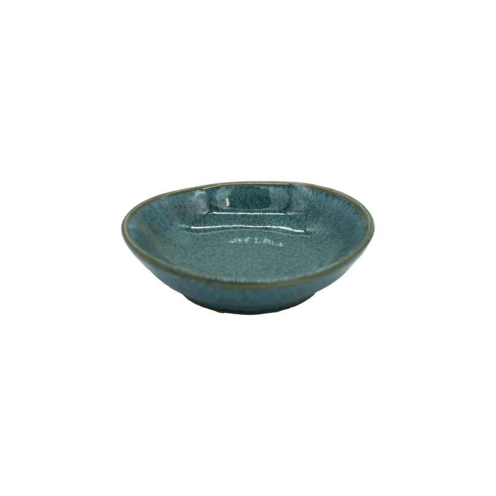 The Soy Sauce Dish - Peacock is a small, round Minoyaki porcelain dish with a greenish-blue glaze, expertly crafted by Japanese artisans and displayed against a white background.