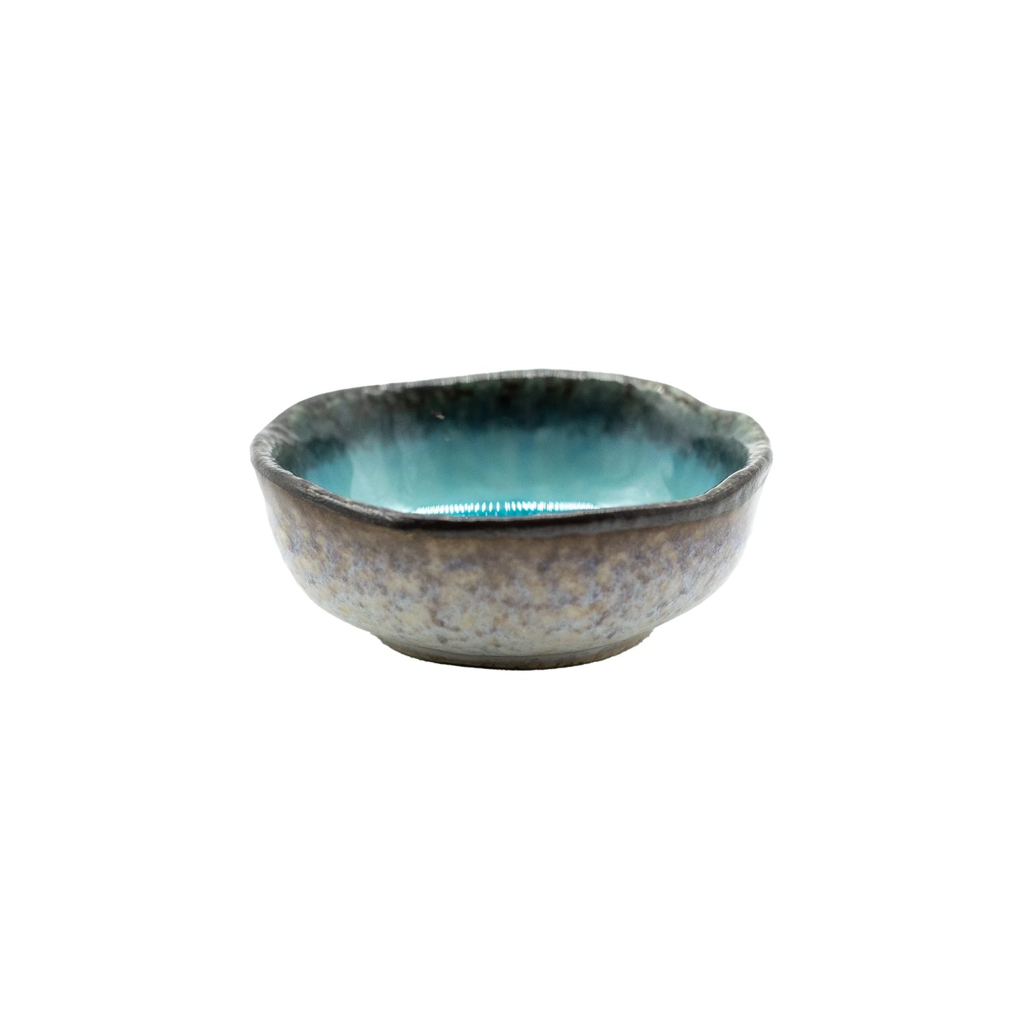 The Soy Sauce Dish - Sky Blue & Black is a small, round Minoyaki porcelain bowl with an uneven rim, a textured black exterior, and a glossy sky blue interior—ideal for serving dipping sauces. Shown on a white background.