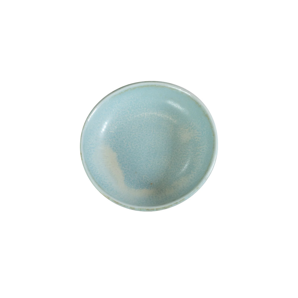 The Soy Sauce Dish - Soda Blue is a small, round Minoyaki porcelain bowl in light blue with a subtle mottled pattern, perfect for dipping sauces. Shown from above on a white background.