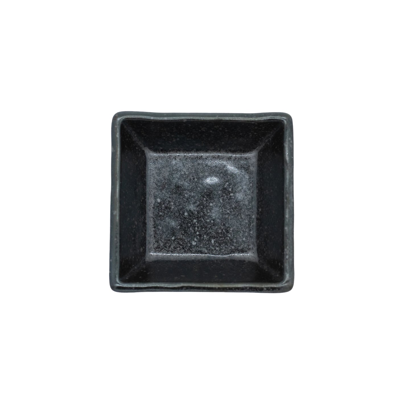 The Soy Sauce Dish - Square in Matt Black is a small, empty square dish photographed from above on a white background.