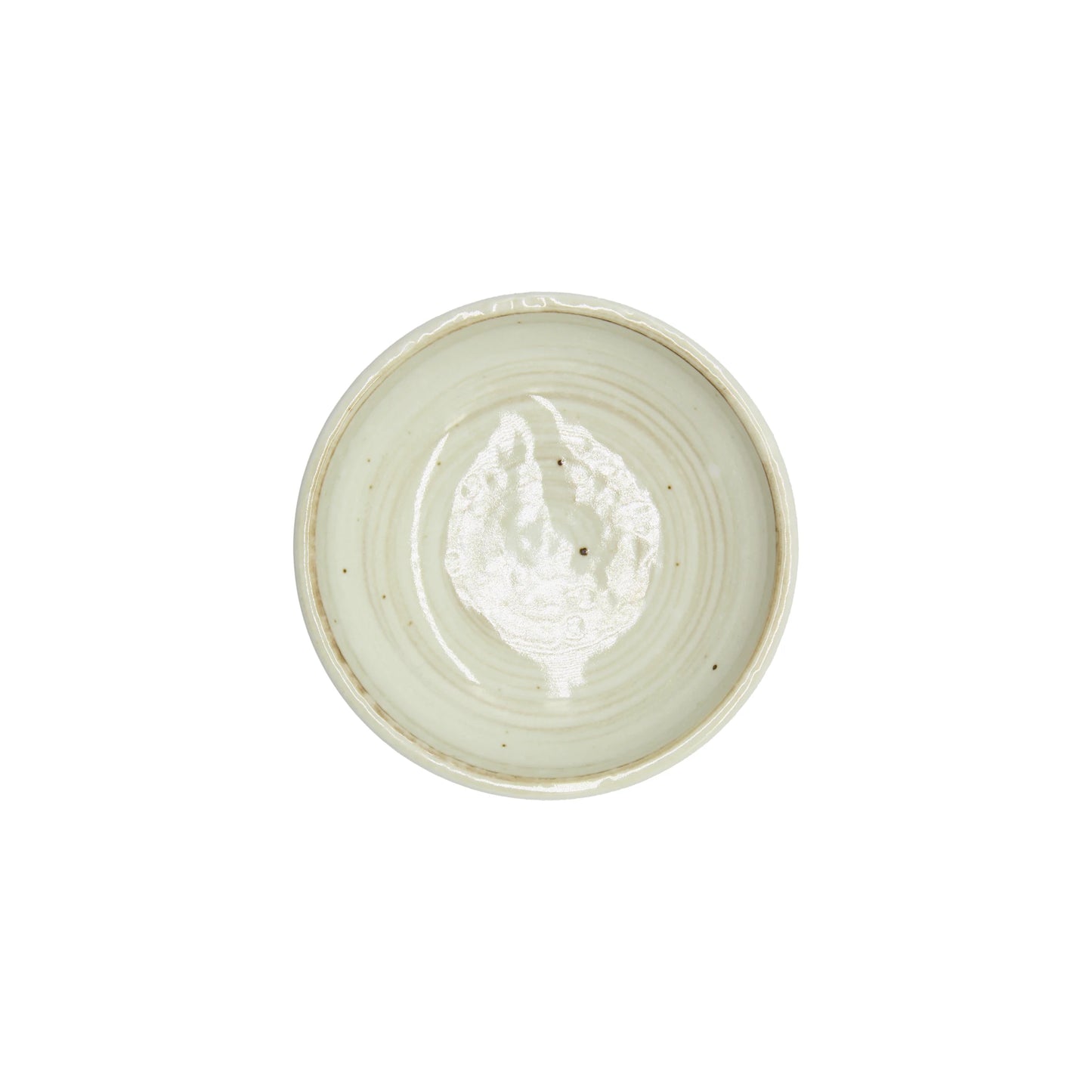
                  
                    The Soy Sauce Dish - White Kohiki Vortex is a round, shallow ceramic bowl with a light beige glaze and subtle spiral vortex design, inspired by Japanese pottery and shown from above on a white background.
                  
                