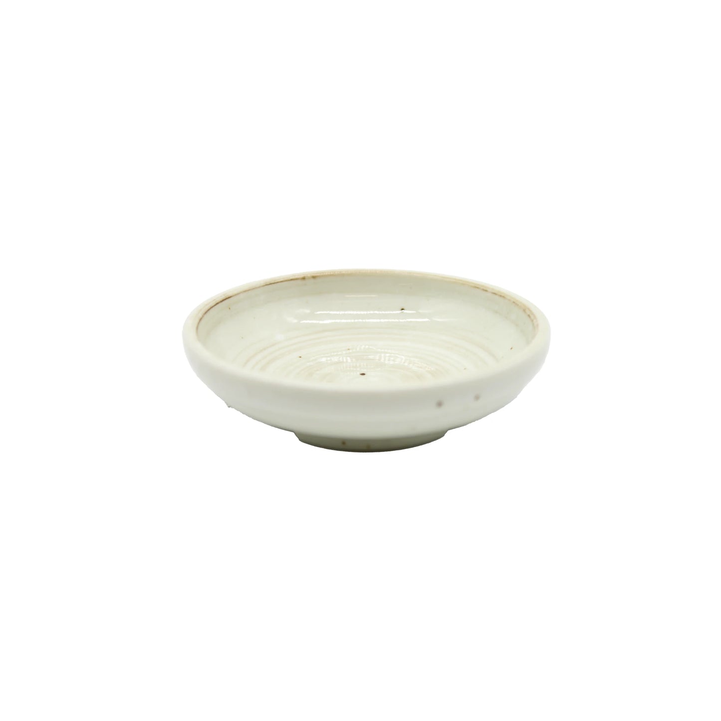 The Soy Sauce Dish - White Kohiki Vortex is a small, shallow, round ceramic dish with a smooth off-white glaze and subtle ridges, inspired by Japanese pottery and Kohiki ware, shown on a plain white background.