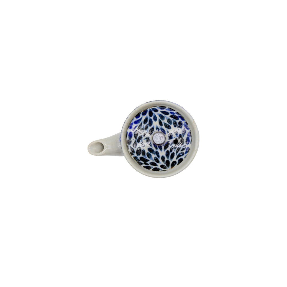 
                  
                    Top view of the Soy Sauce Pourer - Blue Peony - 8.5cm, featuring a blue and black patterned interior inspired by traditional Japanese ceramics, with a single handle, set against a white background.
                  
                