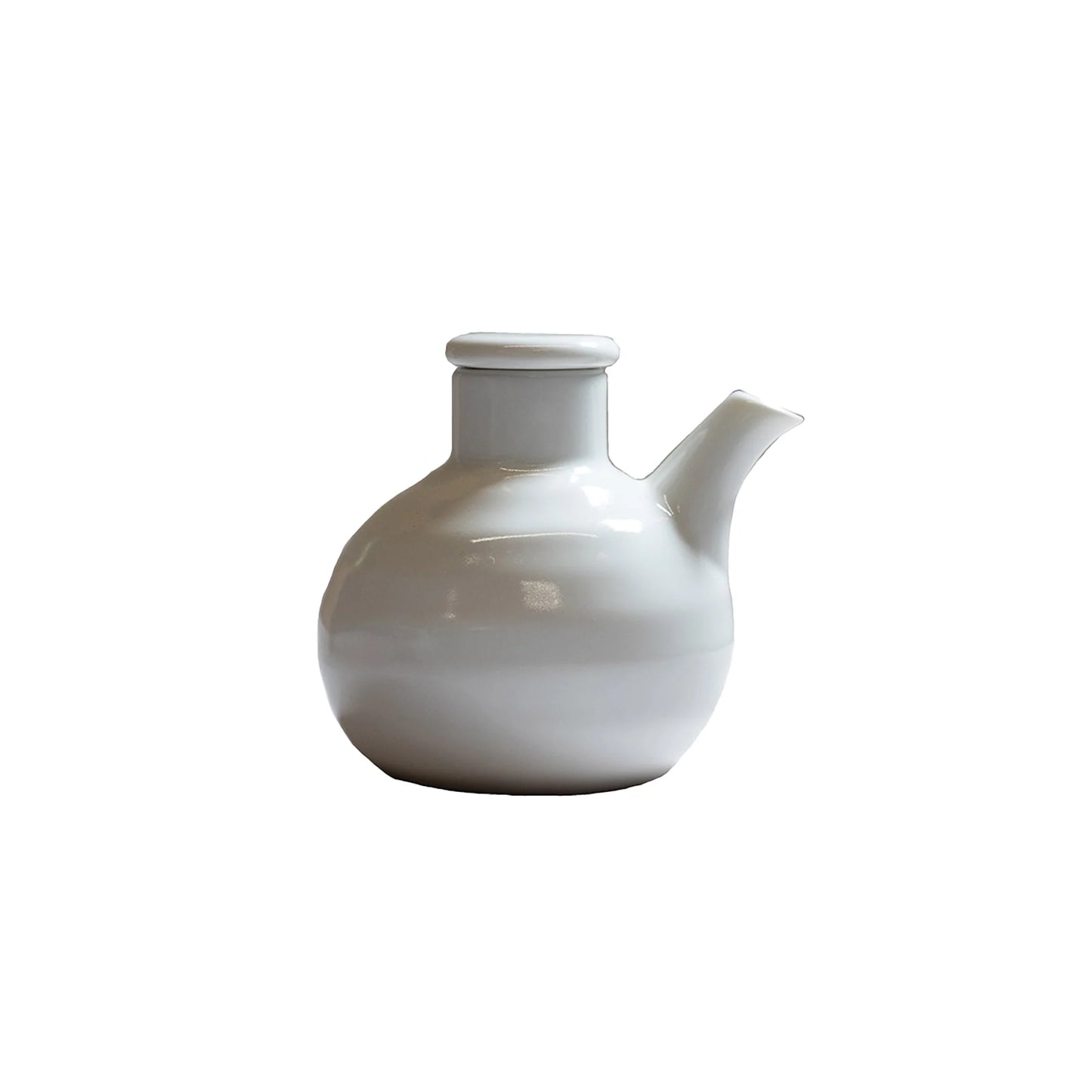 The Soy Sauce Pourer - White Round is a stylish Japanese ceramic pourer with a rounded body, short spout, and flat lid, shown against a plain white background.