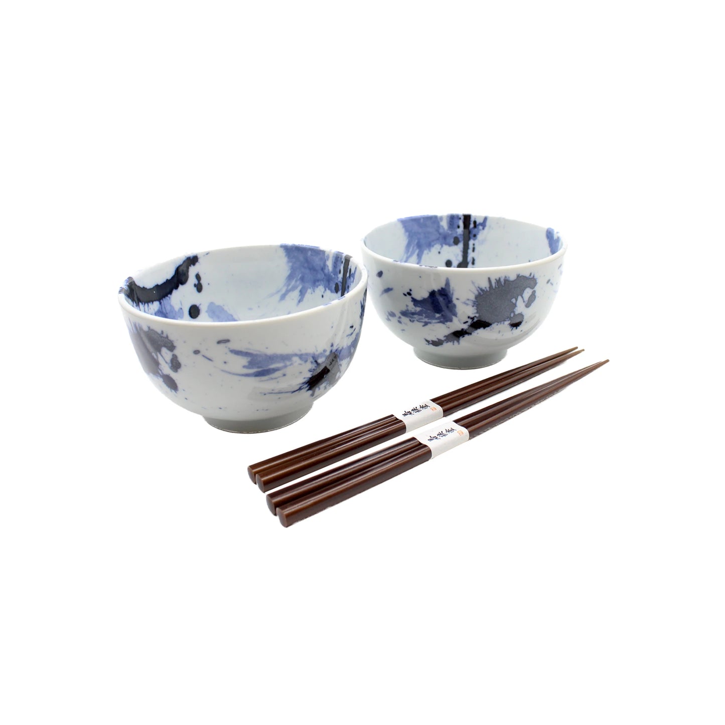 
                  
                    The Splash Design Bowls Boxed Set - Blue and White features two handmade blue-splatter bowls and two pairs of wooden chopsticks, inspired by Japanese design, arranged against a white background.
                  
                